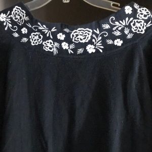 Christopher & Banks black women’s top with white embroidered neck and sleeves. L
